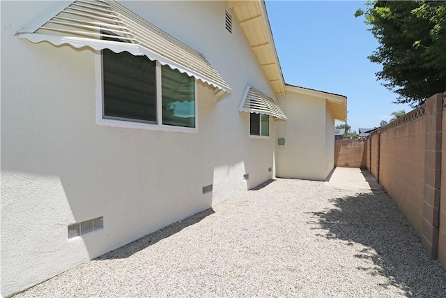1116 N Center St, Orange, CA 92867 - view of property exterior with stucco siding and a patio area