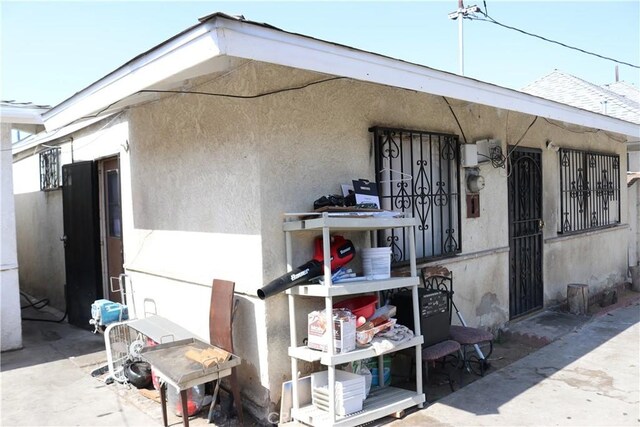 164 N Townsend Ave, City Terrace, CA 90063 - entrance to property with stucco siding