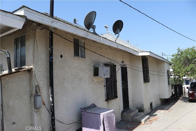 164 N Townsend Ave, City Terrace, CA 90063 - view of home's exterior featuring stucco siding and entry steps