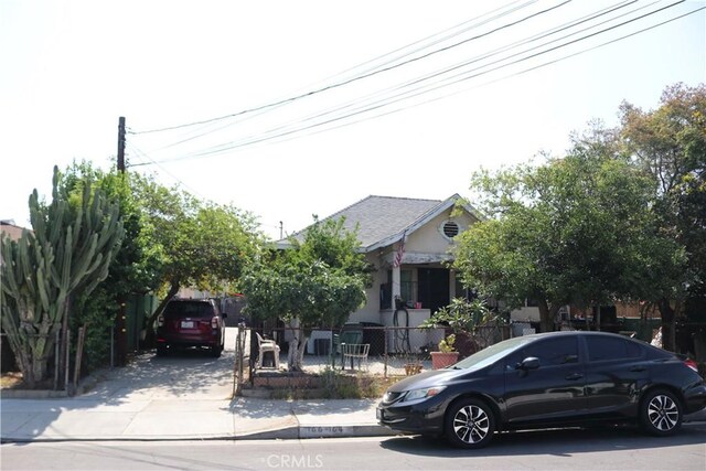 164 N Townsend Ave, City Terrace, CA 90063 - obstructed view of property with concrete driveway