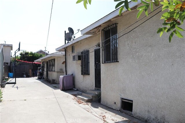 164 N Townsend Ave, City Terrace, CA 90063 - view of home's exterior with a patio and stucco siding