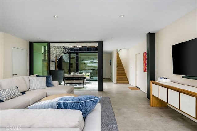 2821 Alma Ave, Manhattan Beach, CA 90266 - living room with a wall of windows, stairs, and concrete flooring