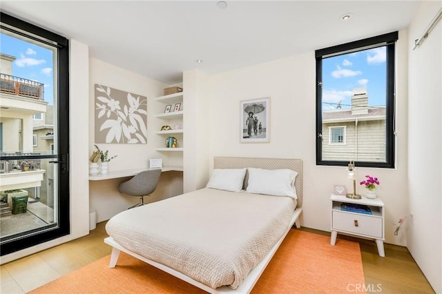 2821 Alma Ave, Manhattan Beach, CA 90266 - bedroom featuring multiple windows and wood finished floors