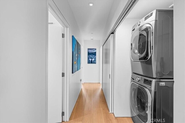 2821 Alma Ave, Manhattan Beach, CA 90266 - laundry room featuring stacked washing machine and dryer, light wood finished floors, and recessed lighting