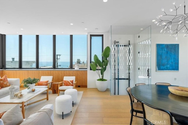 2821 Alma Ave, Manhattan Beach, CA 90266 - living room with light wood-style flooring, a chandelier, and recessed lighting