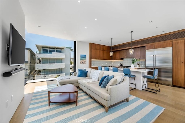 2821 Alma Ave, Manhattan Beach, CA 90266 - living area featuring light wood-style floors