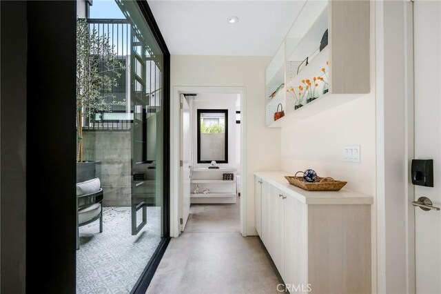 2821 Alma Ave, Manhattan Beach, CA 90266 - hallway with finished concrete flooring