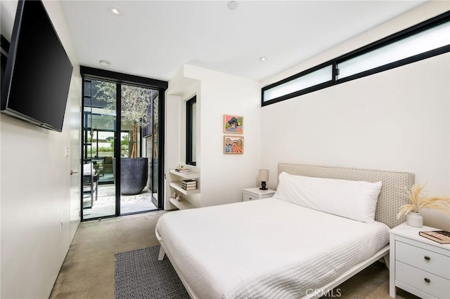 2821 Alma Ave, Manhattan Beach, CA 90266 - bedroom with access to outside, finished concrete floors, and a wall of windows