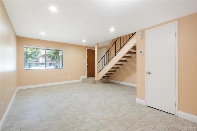 955 Amistad Pl Unit C, El Cajon, CA 92019 - unfurnished living room with stairs and recessed lighting