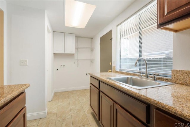 955 Amistad Pl Unit C, El Cajon, CA 92019 - kitchen featuring a sink and white cabinetry