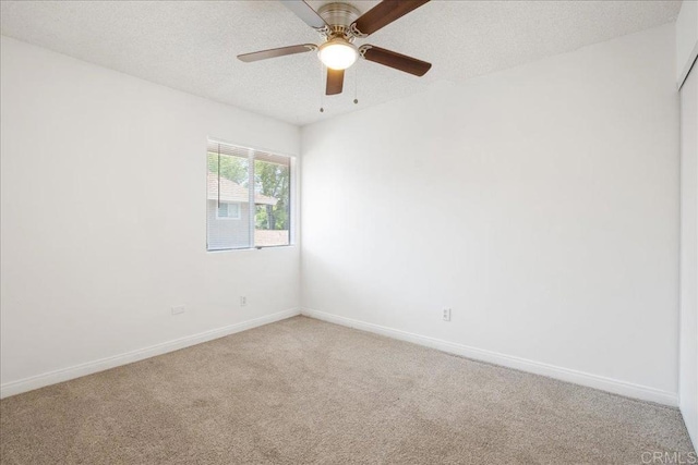 955 Amistad Pl Unit C, El Cajon, CA 92019 - empty room with light colored carpet, a textured ceiling, and ceiling fan