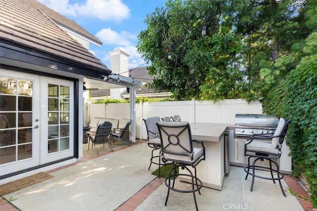 1174 Kingston St, Costa Mesa, CA 92626 - view of patio / terrace with french doors and grilling area