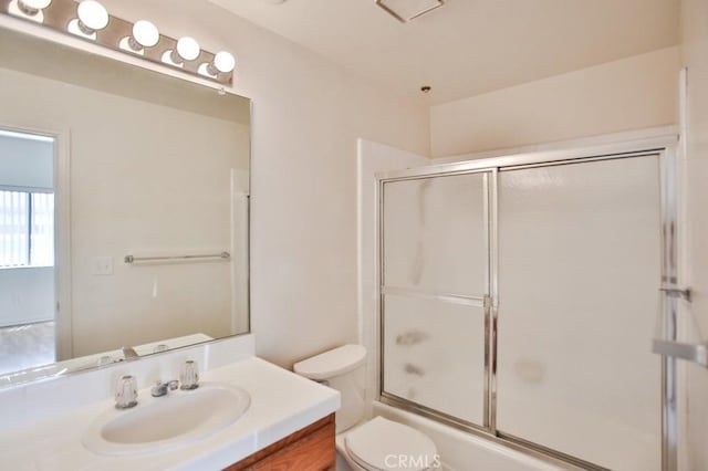 11600 Warner Ave Unit 428, Fountain Valley, CA 92708 - full bathroom featuring vanity and bath / shower combo with glass door