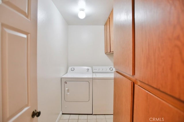 11600 Warner Ave Unit 428, Fountain Valley, CA 92708 - laundry area with cabinet space, separate washer and dryer, and light tile patterned flooring