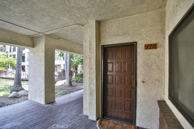 11600 Warner Ave Unit 428, Fountain Valley, CA 92708 - entrance to property featuring stucco siding and radiator