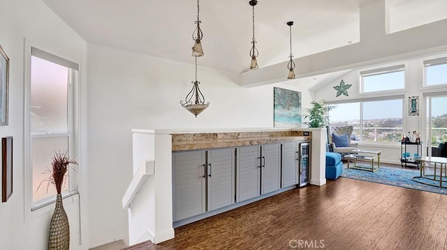 24965 Seagate, Dana Point, CA 92629 - kitchen with dark wood-type flooring, vaulted ceiling, pendant lighting, and gray cabinets