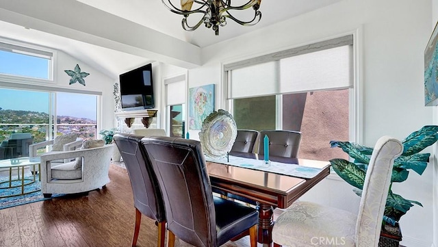 24965 Seagate, Dana Point, CA 92629 - dining room featuring a chandelier, lofted ceiling, and wood finished floors