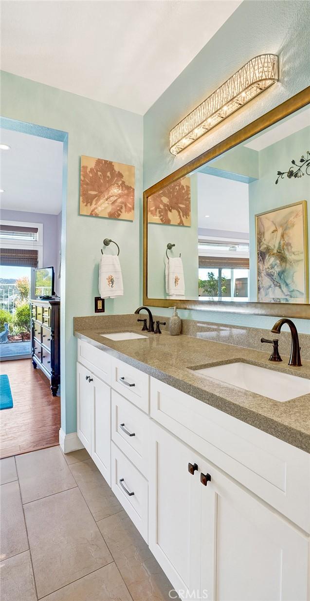 24965 Seagate, Dana Point, CA 92629 - bathroom featuring double vanity and tile patterned flooring