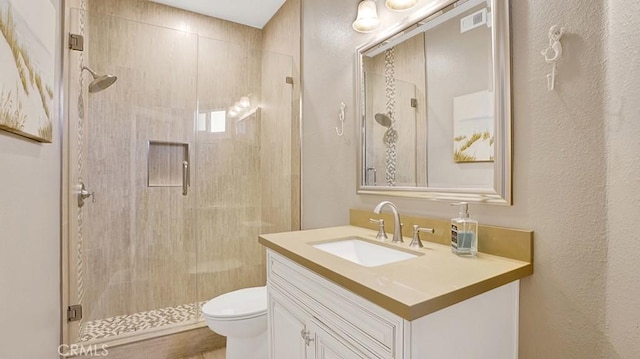 24965 Seagate, Dana Point, CA 92629 - bathroom featuring vanity, a shower stall, and a textured wall