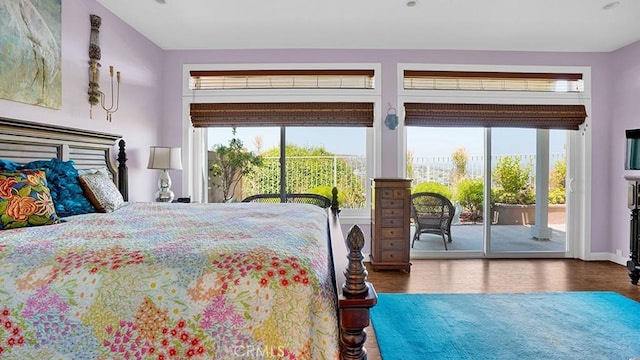 24965 Seagate, Dana Point, CA 92629 - bedroom featuring access to exterior, multiple windows, and wood finished floors