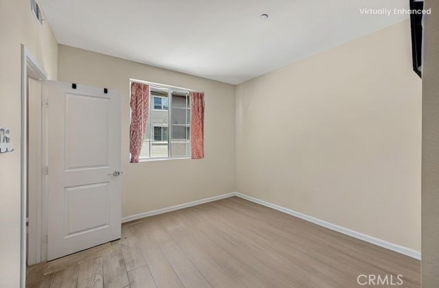 1152 Newberry Ln, Claremont, CA 91711 - spare room with light wood-type flooring and baseboards