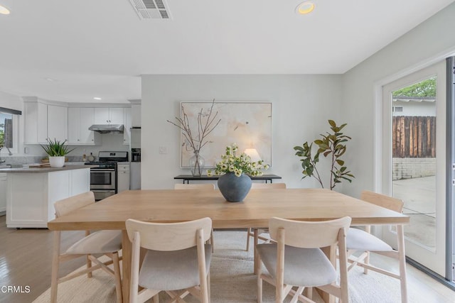 455 E Laurel Ave, Sierra Madre, CA 91024 - dining area with healthy amount of natural light, recessed lighting, and light wood finished floors