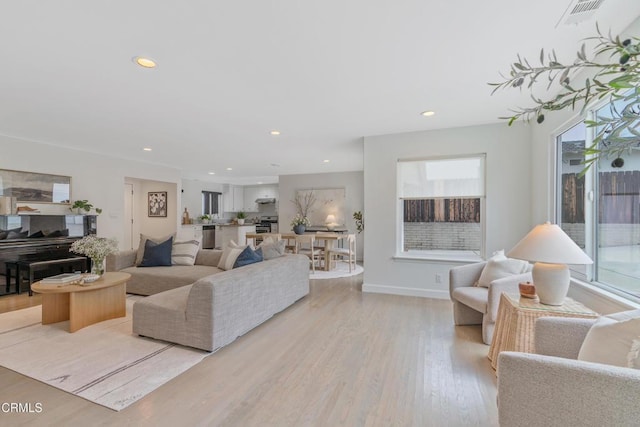 455 E Laurel Ave, Sierra Madre, CA 91024 - living room featuring light wood-style flooring and recessed lighting