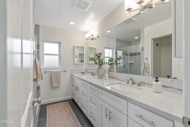 455 E Laurel Ave, Sierra Madre, CA 91024 - bathroom featuring double vanity and a stall shower