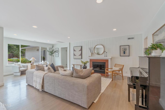 455 E Laurel Ave, Sierra Madre, CA 91024 - living area featuring a brick fireplace, light wood-type flooring, and recessed lighting
