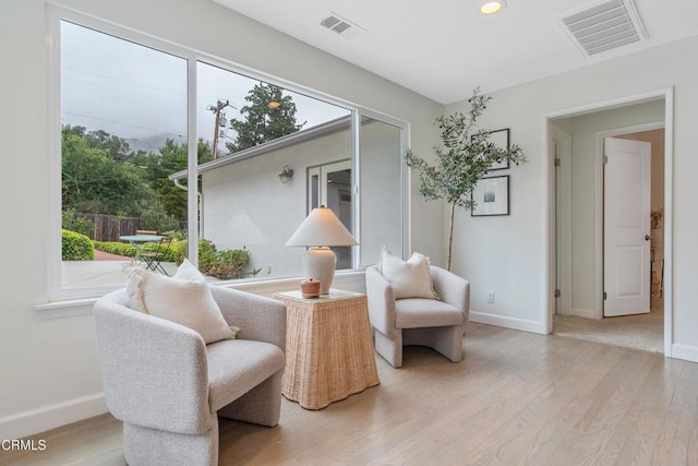 455 E Laurel Ave, Sierra Madre, CA 91024 - sitting room featuring plenty of natural light, wood finished floors, and recessed lighting