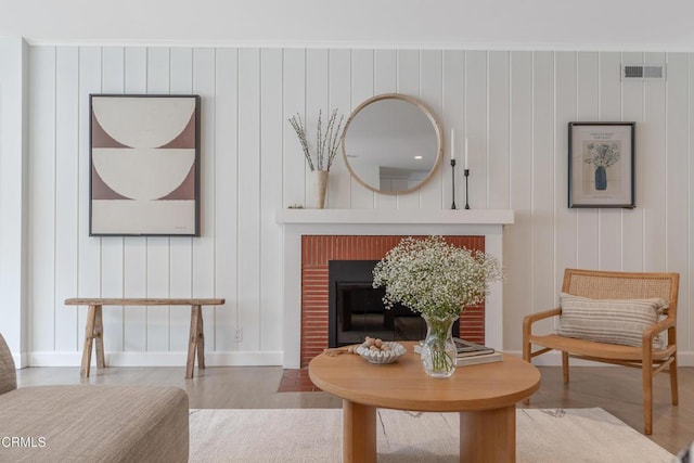 455 E Laurel Ave, Sierra Madre, CA 91024 - living room featuring wood finished floors and a fireplace