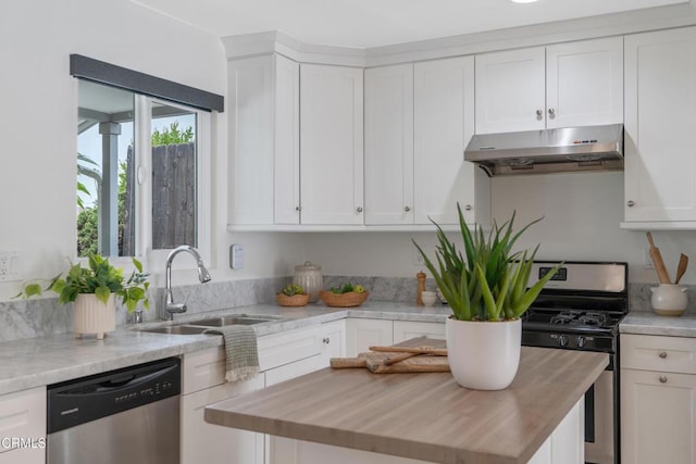 455 E Laurel Ave, Sierra Madre, CA 91024 - kitchen with appliances with stainless steel finishes, under cabinet range hood, wood counters, and white cabinets