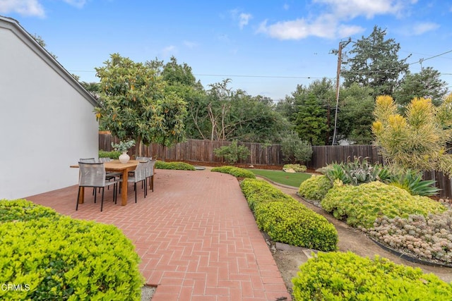 455 E Laurel Ave, Sierra Madre, CA 91024 - fenced backyard featuring a patio and outdoor dining area
