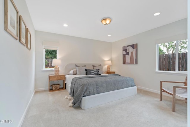 455 E Laurel Ave, Sierra Madre, CA 91024 - bedroom with light colored carpet, multiple windows, and recessed lighting