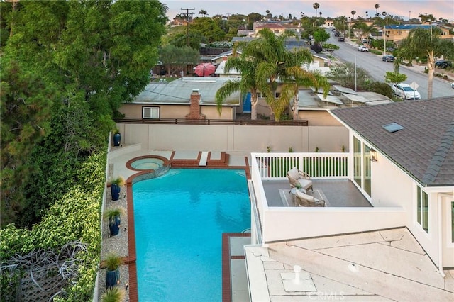 245 Surf Pl, Seal Beach, CA 90740 - view of swimming pool featuring a pool with connected hot tub and a residential view
