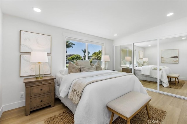 245 Surf Pl, Seal Beach, CA 90740 - bedroom with light wood finished floors and recessed lighting