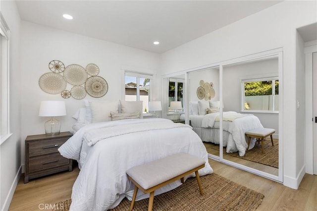 245 Surf Pl, Seal Beach, CA 90740 - bedroom featuring light wood finished floors, recessed lighting, and a closet