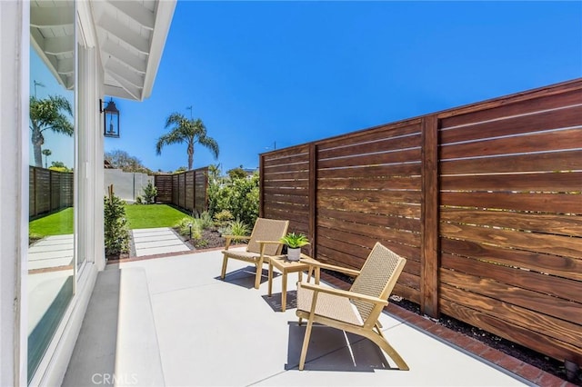 245 Surf Pl, Seal Beach, CA 90740 - fenced backyard with a patio