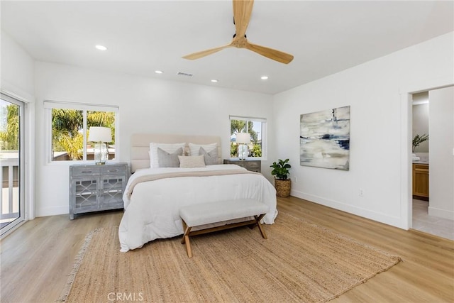 245 Surf Pl, Seal Beach, CA 90740 - bedroom featuring light wood-style floors, multiple windows, recessed lighting, a ceiling fan, and ensuite bathroom