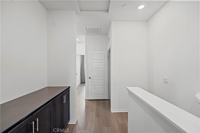 253 Steely, Irvine, CA 92614 - hallway with wood finished floors and recessed lighting