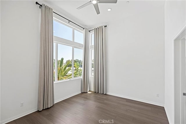 253 Steely, Irvine, CA 92614 - empty room featuring healthy amount of natural light, ceiling fan, dark wood-style flooring, and recessed lighting