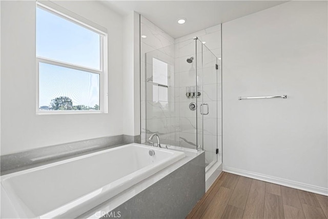 253 Steely, Irvine, CA 92614 - full bathroom with a garden tub, a stall shower, recessed lighting, and wood finished floors