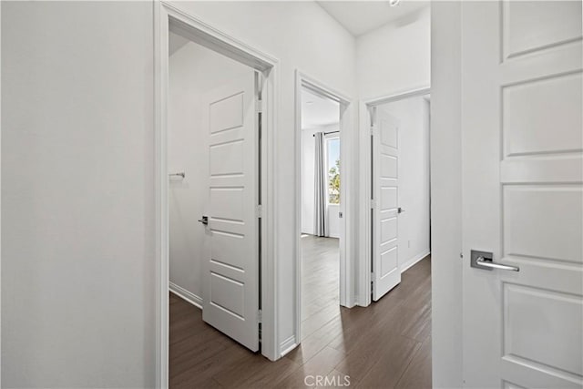 253 Steely, Irvine, CA 92614 - hall with dark wood-type flooring and baseboards
