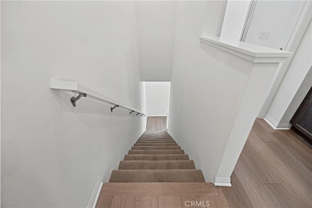 253 Steely, Irvine, CA 92614 - staircase with wood finished floors and baseboards