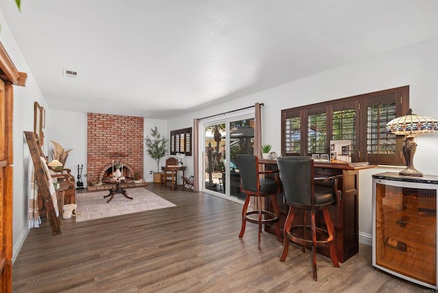 2046 Ups Cir, Oceanside, CA 92054 - office area with wine cooler, bar area, wood finished floors, and a fireplace