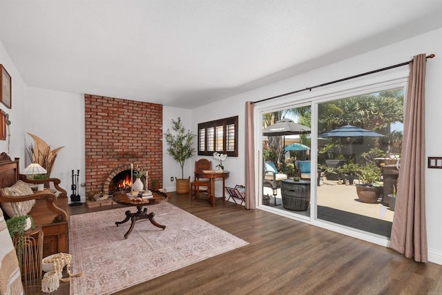 2046 Ups Cir, Oceanside, CA 92054 - living room featuring dark wood-style flooring and a brick fireplace