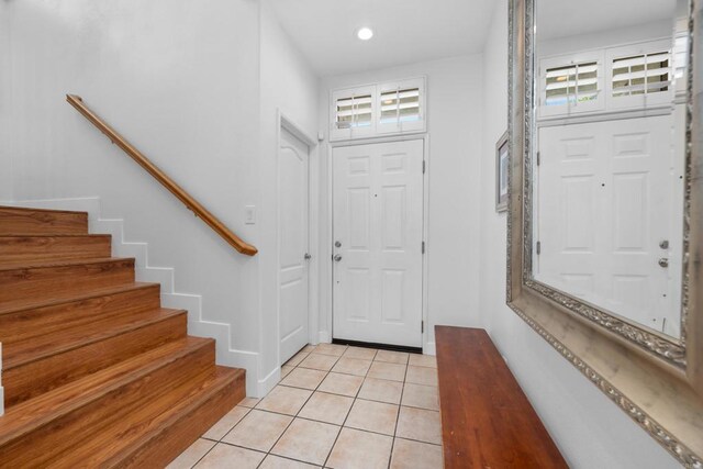 210 Belflora Way, Oceanside, CA 92057 - foyer entrance with light tile patterned floors, stairs, and recessed lighting