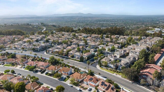 210 Belflora Way, Oceanside, CA 92057 - aerial overview of property's location featuring a mountain backdrop and nearby suburban area