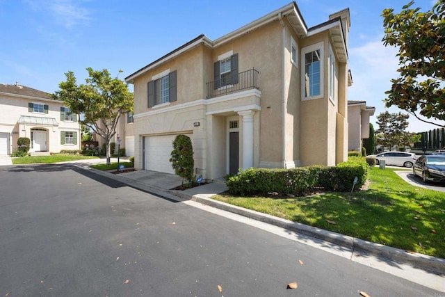 210 Belflora Way, Oceanside, CA 92057 - view of front of property featuring stucco siding, a garage, a balcony, driveway, and a front yard