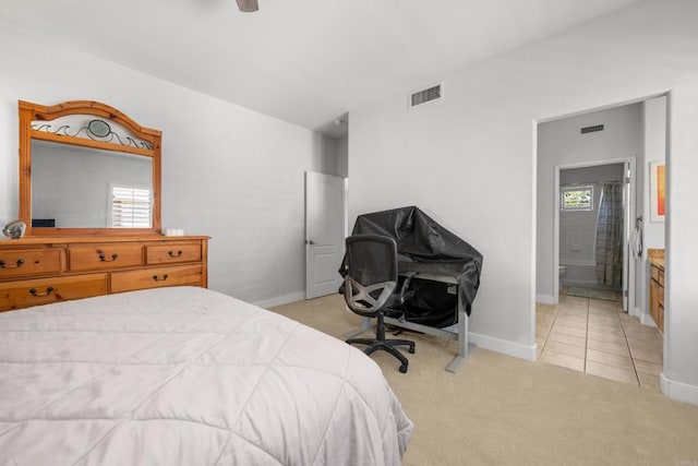 210 Belflora Way, Oceanside, CA 92057 - bedroom featuring light carpet, ensuite bathroom, ceiling fan, and light tile patterned floors